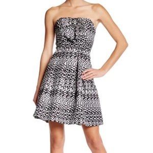 Anthropologie | Eva Franco Strapless Black and Silver Bow Dress
